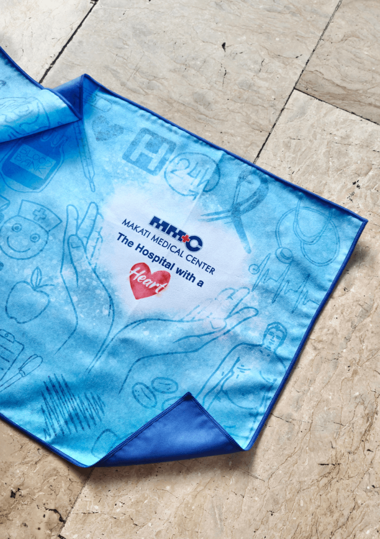 MAGWAI Custom Towel for Client Makati Medical Center, recycled from plastic bottles, microfiber cloth, absorbent and quick-drying, sand-proof. Perfect sustainable corporate gift for PR events, VIP clients, tema-building, employee welcome kits.